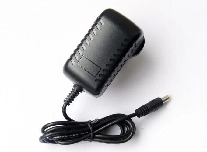 ईयू विनियमित एसी डीसी 9वी पावर एडाप्टर 1 ए 2ए 24w 2000ma 12v पीएसयू बिजली आपूर्ति
